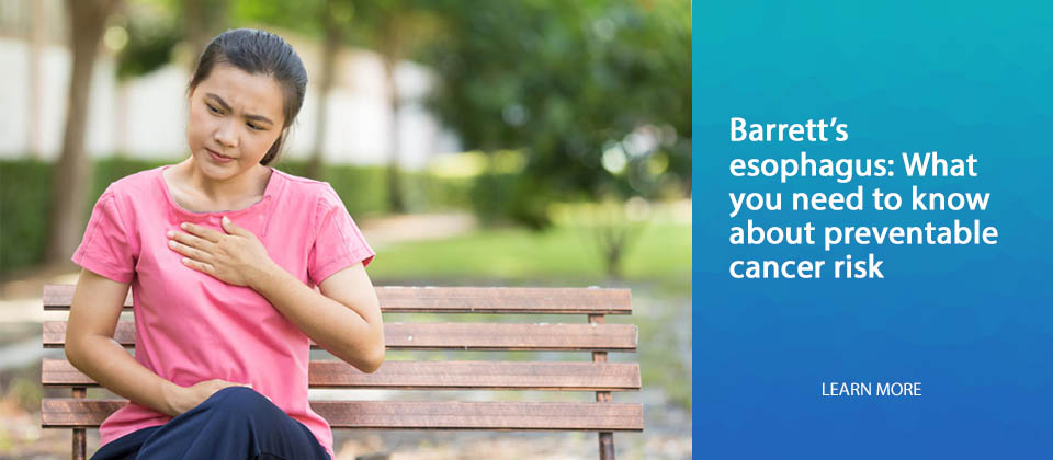 Barrett's esophagus: Woman holding hand to chest