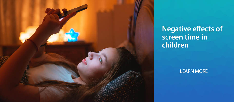 Image of teen girl looking at her phone in bed and article title