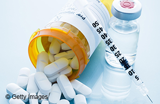 Diabetes prescription pills and syringe